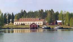 Timmerflottningsf�reningens byggnader och bogserb�tar i Utra i staden Joensuu. 