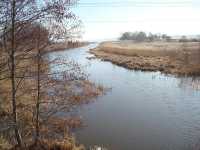 Kanalen �sterut fr�n v�gbron. Klockarg�rdsudden i bakgrunden