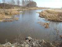 Kanalen v�sterut fr�n bron med Tid� Lind� Marin i bakgrunden